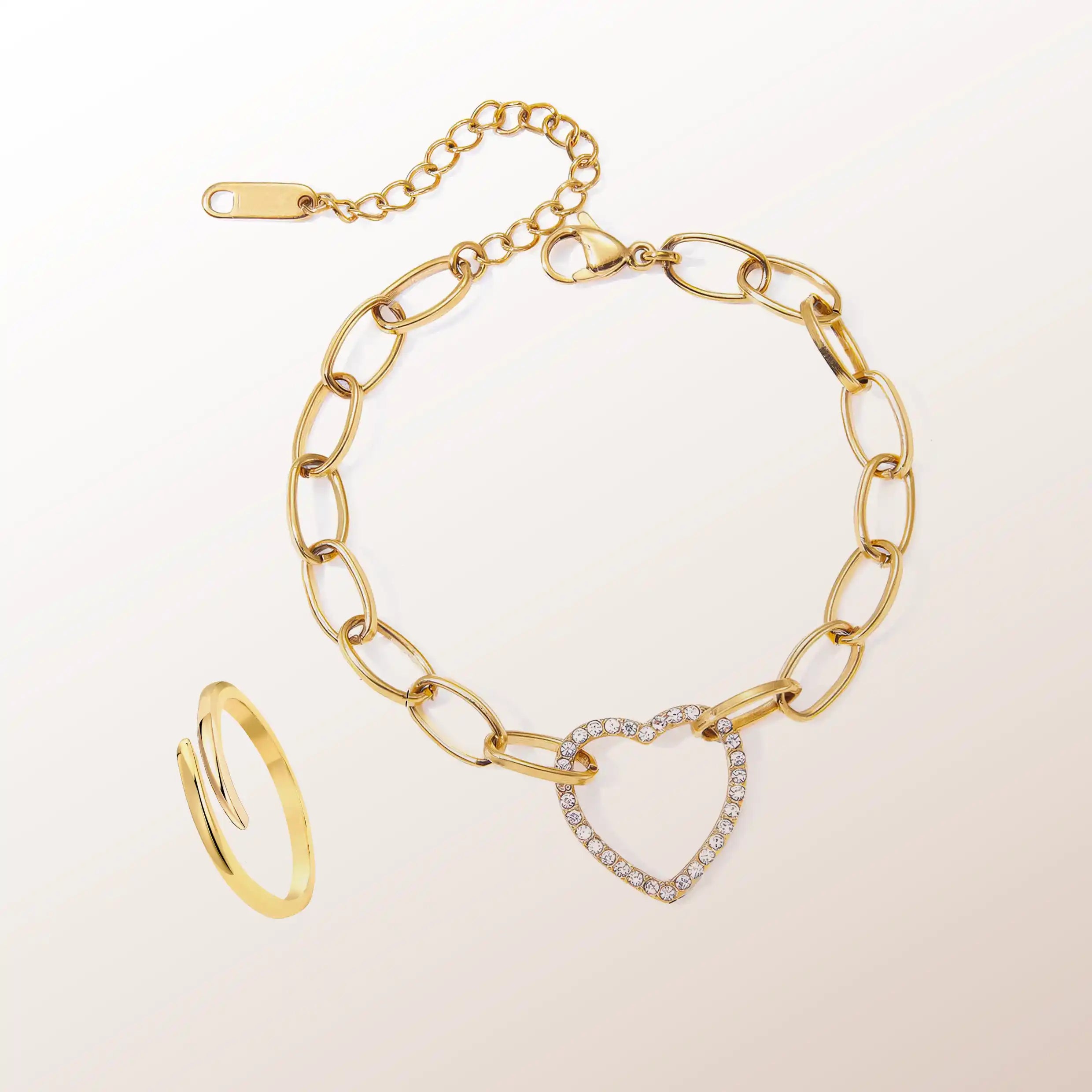 18K gold plated chain-link bracelet with crystal heart charm and adjustable clasp, styled with a gold coil ring — HYFN