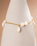 18K gold plated pearl charm chain bracelet on display — HYFN