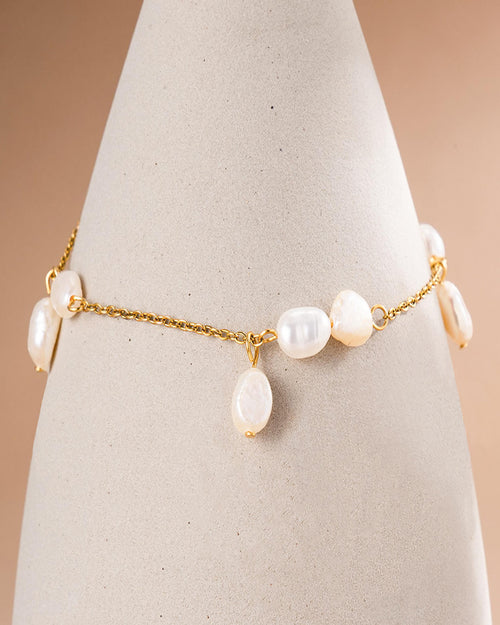 18K gold plated pearl charm chain bracelet on display — HYFN